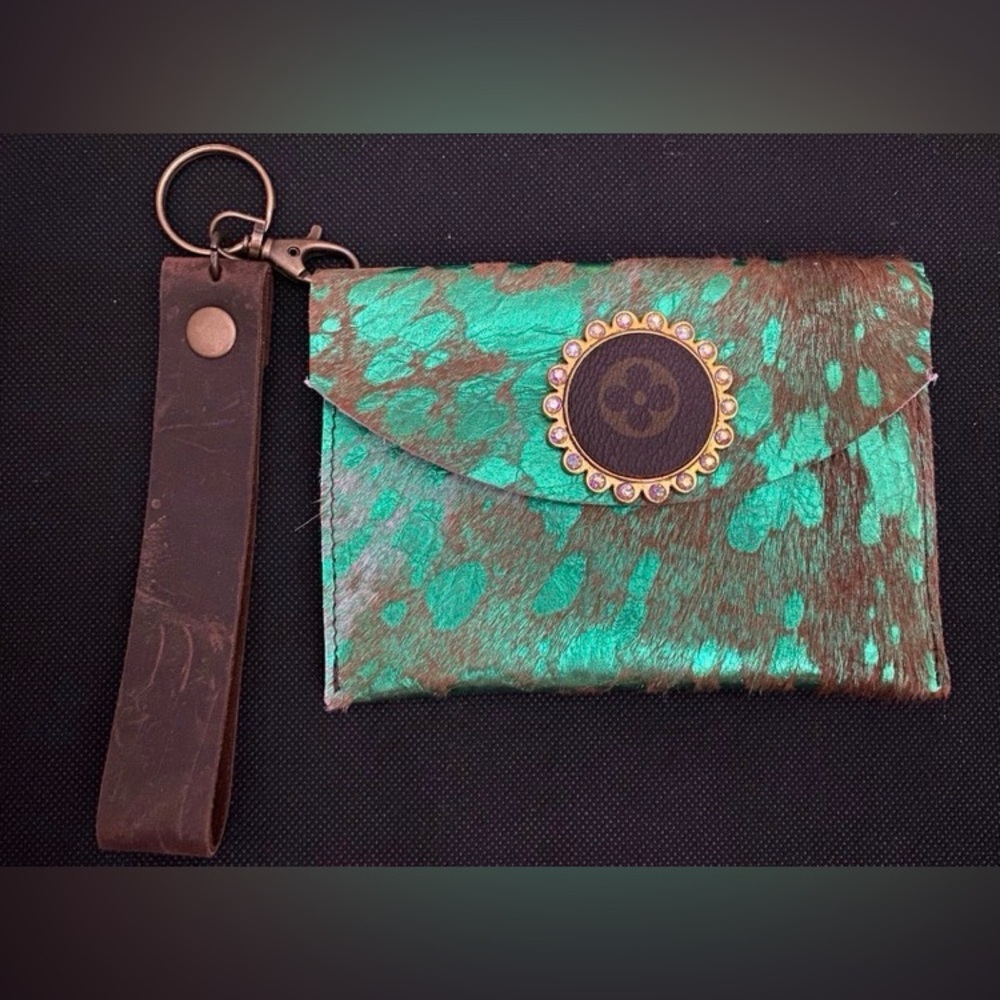 Green and brown iridescent envelope wristlet.